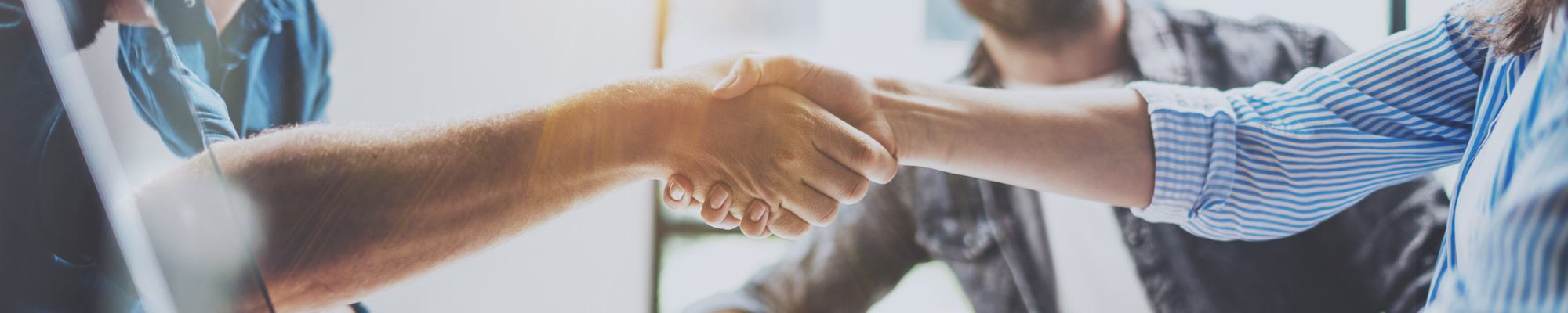 Handshake-Between-Two-People-Trusting-Landers-Premier-Flooring